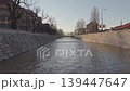 Sarajevo Miljacka river aerial drone rise revealing city skyline at sunset 139447647