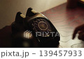 Old-fashioned black phone 139457933