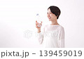 Middle woman drinking water 139459019