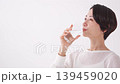 Middle woman drinking water 139459020