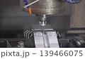 The CNC milling machine rough cutting the mold parts by flat nose end mill tools. The mold and die manufacturing process by machining center with the solid flat nose tools. 139466075