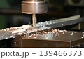 The pan scene plunge rough cutting process on NC milling machine with metal plate parts. The metal working concept on the milling machine. 139466373