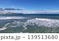 Aerial Ocean View With Rolling Waves Turquoise Water, White Foam, Distant Headland And Clear Blue Sky, Gentle 139513680