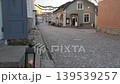 Porvoo.Finland-December 12.2020: Beautiful ancient street and architecture in the city of Porvoo Finland. Showing the idyllic old town during late autumn on a sunny day. 139539257