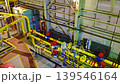 UAV infrastructure survey. Remote drone captures precise layout of piping and support frameworks. Unmanned aerial systems provide comprehensive mapping of infrastructure components from above 139546164
