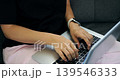 Creative writer focused on editing. Solo Asian female author diligently editing her latest manuscript. Independent woman from Asia composing and polishing her written work at her desk 139546333