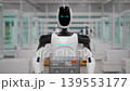 Close-up of an AI-powered Humanoid Robot Carrying Crates with Lithium-Ion Battery Modules in a Fully Automated Electric Car Factory. Blurred Background. 3d animation render 139553177