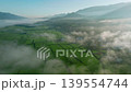 Aerial views of the rice field with clouds. Flying above the clouds 139554744