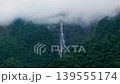 Aerial view misty foggy mountain landscape with clouds and waterfall 139555174