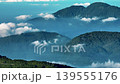 Aerial view misty foggy mountain landscape with clouds and waterfall 139555176