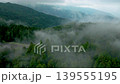 Aerial view misty foggy mountain landscape with clouds 139555195