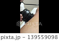 Lymphatic drainage massage on the device in salon 139559098
