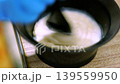 mixing hair dye close-up 139559950