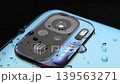 Macro close up of a smartphone camera lens on back 139563271
