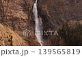 Cinematic aerial view of Takakkaw Falls, one of Canada's highest waterfalls, plunging from Daly Glacier in Yoho National Park, British Columbia, Canada. Typical High quality 4k footage 139565819
