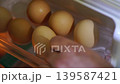 open the refrigerator and take the eggs. 139587421