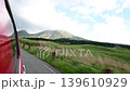 The magnificent natural scenery of Aso as seen from inside a moving car 139610929