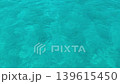 background with blue ripples and waves on the water surface. Waves reflecting light, a swimming pool, sea, ocean. Clear water, splashes, waves, viewed from above. Summer vacation, relaxation, weekend 139615450