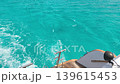 A view from yacht cutting through the blue sea. Freedom, movement, pure energy, and a leisurely journey across open water. vacation getaway for the holidays, weekends, and more. High quality 4K video 139615453