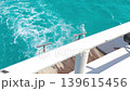 A view from yacht cutting through the blue sea. Freedom, movement, pure energy, and a leisurely journey across open water. vacation getaway for the holidays, weekends, and more. High quality 4K video 139615456