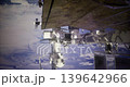 The International Space Station is prominently positioned against a backdrop of swirling clouds and blue oceans, highlighting human innovation in space exploration and research. 139642966