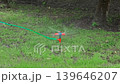 rotating lawn sprinkler, close-up, slow motion 139646207