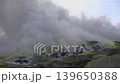 Sulfur fumaroles and chloride crusts on the crater rim, geothermal activity on the slopes of Vulcano Islands, Italy.  139650388
