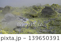 Sulfur fumaroles and chloride crusts on the crater rim, geothermal activity on the slopes of Vulcano Islands, Italy.  139650391