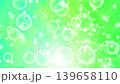 Fluffy circles and sparkling animated video flowing from side to side / Green 139658110