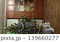 Firecracker explodes with bright confetti on the Christmas tree. Slow motion video 139660277