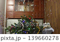 Firecracker explodes with bright confetti on the Christmas tree. Slow motion video 139660278