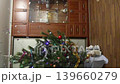 Firecracker explodes with bright confetti on the Christmas tree. Slow motion video 139660279