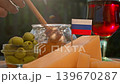 Russian livestock products, cheese, and honey form a calm rustic display with local country charm. 139670287