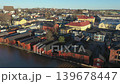Porvoo.Finland-December 12.2020: Drone shot of riverside houses with cars on the street in Porvoo Finland looking towards the city with a clear blue sky in late autumn 139678447