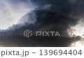 Fast rolling storm clouds creating an intense atmospheric sky scene shot 139694404