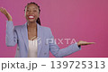 Wow, marketing and promotion with a business black woman in studio on a pink background holding a product. Portrait, surprise or advertising with an attractive young female showing blank mockup space 139725313