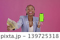 Black woman, money and phone with green screen on mockup for winning, lottery or cash against studio background. Happy African female in celebration for bonus win on smartphone with chromakey display 139725318
