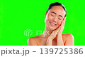 Beauty, hand on face and asian woman on green screen background for skincare, dermatology and cosmetic. Aesthetic female model portrait with spa facial or self care glow on skin with mockup in studio 139725386