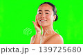 Beauty, smile and portrait of asian woman on green screen for skincare, cosmetics or dermatology. Face of female model hands on soft skin for self care, facial glow and natural shine or studio mockup 139725680