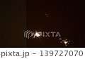 Burning sparkler on a dark background. Slow motion video 139727070