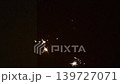 Burning sparkler on a dark background. Slow motion video 139727071
