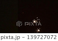 Burning sparkler on a dark background. Slow motion video 139727072