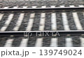 railroad outside the window of a moving train 139749024