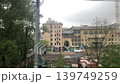 city outside the window of a moving train 139749259