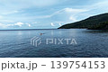 Traditional Jukung Boat on Calm Waters off the Coast of Amed Bali 139754153