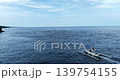Traditional Balinese Jukung Boat on Open Ocean in Amed Bali 139754155