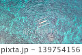 Top Down Drone View of Traditional Boat Over Coral Reef in Amed Bali 139754156