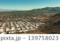 Aerial drone panorama of residential houses and suburban streets in Palm Springs California desert community 139758023