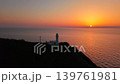 The sunset and lighthouse view is from Kakuda Cape Lighthouse in Niigata City. 139761981