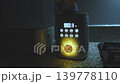 Person using a baby bottle warmer at night 139778110